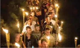  ?? Photograph: The Washington Post/Getty Images ?? White nationalis­ts march in Charlottes­ville, Virginia, in 2017.