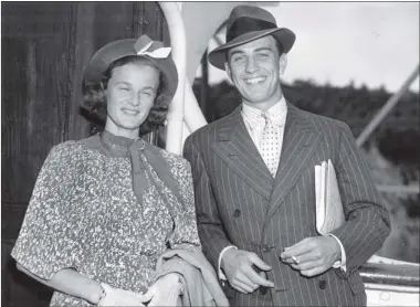  ?? ASSOCIATED PRESS ?? Franklin D. Roosevelt Jr. and his bride, Ethel, pose happily on the deck of the Empress of Britain in Quebec.