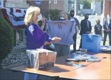  ?? RACHEL RAVINA - MEDIANEWS GROUP ?? U.S. Rep. Madeleine Dean, D-4th Dist., presented an Upper Moreland sweatshirt to Jill Biden on Thursday afternoon at an event in Jenkintown. Biden is an alumna of Upper Moreland High School.