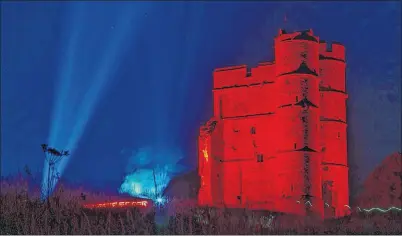  ?? Picture: Mark Chance ?? Donnington Castle was illuminate­d by Moonraker Disco