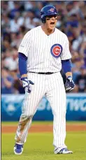  ?? BRIAN CASSELLA/TRIBUNE NEWS SERVICE ?? Chicago Cubs first baseman Anthony Rizzo (44) celebrates his RBI single in the eighth inning on Monday in Game 3 of a National League Division Series playoff in Chicago.