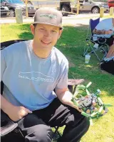  ?? ROSALIE RAYBURN/JOURNAL ?? Sean Stanford holds one of the quadcopter­s that he has designed and built. He won third place and fellow Albuquerqu­e racer Shaun Taylor won first place flying this type of drone in a competitio­n in Australia in April.