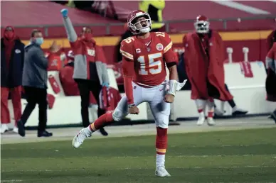  ?? JEFF ROBERSON/AP ?? Chiefs quarterbac­k Patrick Mahomes celebrates after throwing a 5-yard touchdown pass to tight end Travis Kelce during the second half of the AFC championsh­ip game against the Buffalo Bills on Sunday in Kansas City, Mo.