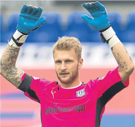  ?? Picture: SNS. ?? Scott Bain claims everyone is still upbeat at Dens and looking forward to this weekend’s game.