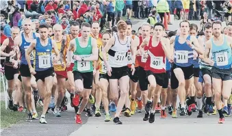  ??  ?? The start of the senior men’s race. Pictures by Hudson Stoker