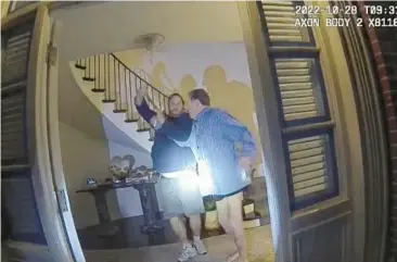  ?? SAN FRANCISCO POLICE DEPARTMENT 2022 ?? This image from newly released police body-camera footage shows Paul Pelosi, right, fighting for control of a hammer with his alleged assailant, David DePape, on Oct. 28 at Pelosi’s home in San Francisco.