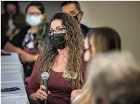  ??  ?? University of New Mexico Los Alamos student Cindy Lopez talks about her difficulti­es juggling school and family to attend college during a roundtable discussion Wednesday.