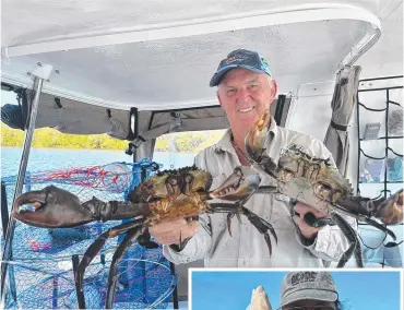  ?? ?? Wayne Young had a great day catching a few big Mud Crabs in the Broadwater.