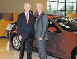  ?? COURTESY PHOTO ?? Park Place Infiniti’s new General Manager Joe Tortomasi, right, meets with Dallas-based Park Place Dealership’s owner Ken Schnitzer.