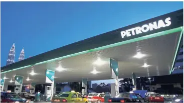  ?? — Reuters ?? Legal battle: Petronas is seeking a stay order in respect of the Sarawak government’s commenceme­nt to regulate upstream activities in the state under the Sarawak Oil Mining Ordinance 1958 (OMO) beginning July 1 this year.