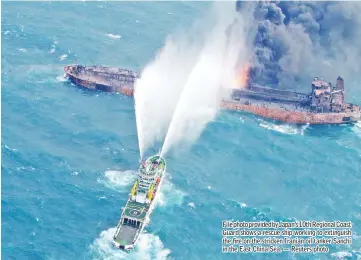  ??  ?? File photo provided by Japan’s 10th Regional Coast Guard shows a rescue ship working to extinguish the fire on the stricken Iranian oil tanker Sanchi in the East China Sea. — Reuters photo