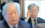  ?? REUTERS ?? New national security adviser John Bolton (right) listens as US President Donald Trump holds a cabinet meeting.