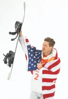  ?? David Ramos / Getty Images ?? After celebratin­g his halfpipe victory, Shaun White again confronted allegation­s of sexual misconduct lodged by a former member of his band.