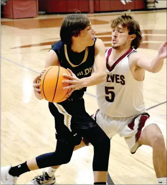  ?? MARK HUMPHREY ENTERPRISE-LEADER ?? Tough man-to-man defense such as this aggressive effort by Lincoln senior Kyler Calvin empowered the Wolves to hold off Shiloh Christian, 44-40, in boys basketball action Friday at Wolfpack Arena. Lincoln was playing its fourth game in four days.