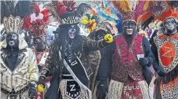  ?? GERALD HERBERT THE ASSOCIATED PRESS ?? New Orleans' Zulu Social Aid &amp; Pleasure Club says its tradition of using black makeup for its Mardi Gras float riders is not the same as "blackface.”