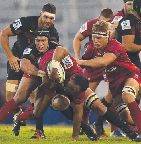  ?? Picture: AFP PHOTO ?? ARDUOUS BATTLE: Reds prop Sam Talakai comes under pressure from Jaguares lock Matias Alemanno.