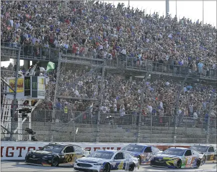  ?? ASSOCIATED PRESS FILE PHOTO ?? Kevin Harvick (4) leads the field past the green flag at the start of the 2017 NASCAR Monster Cup at Darlington Raceway in Darlington, S.C.