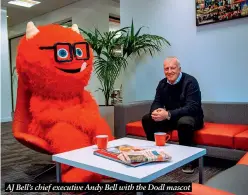  ?? ?? AJ Bell’s chief executive Andy Bell with the Dodl mascot