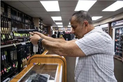  ?? ?? Newly purchased firearms may have had a role in the nationwide increase in murders. Photograph:Brittainy Newman/AP