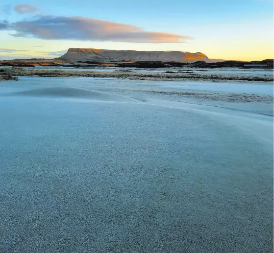  ??  ?? Many thanks to Berenice Beukes, who sent us this fabulous, frosty view of Benbulben from County Sligo Golf Club in Rosses Point. It was taken just after 9am on Sunday morning.