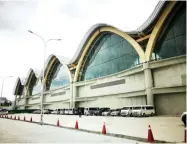  ??  ?? MCIA’s Terminal 2 is said to be the first airport in Asia to use glulam (glue-laminated) on its roof structure, which forms the roof curvature and defines its geometry and modularity.