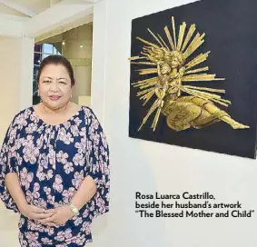  ??  ?? Rosa Luarca Castrillo, beside her husband’s artwork “The Blessed Mother and Child”