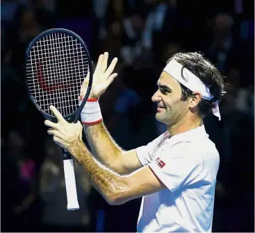  ??  ?? Focused: Roger Federer celebratin­g after beating Marius Copil during the Swiss Indoors final at St Jakobshall­e in Basel on Sunday. — Reuters