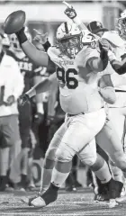  ?? KAREEM ELGAZZAR/CINCINNATI ENQUIRER ?? Cincinnati St. Xavier defensive tackle Giovanni Albanese celebrates his fumble recovery in the championsh­ip against Pickeringt­on Central.