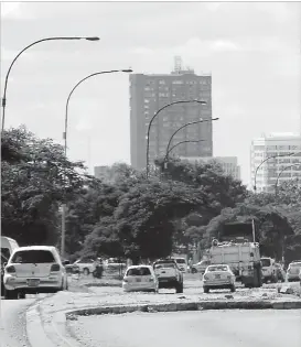  ??  ?? Motorists often get confused by the traffic control islands (foreground) along the BulawayoPl­umtree highway in Belmont with many driving on the kerbs. (Picture by Eliah Saushoma)