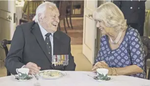  ??  ?? Geoffrey Wellum with the Duchess of Cornwall at a Clarence House reception for veteran and widows in 2016; the dashing young pilot in 1939, bottom