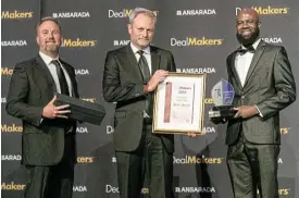  ?? ?? Ferdi Vorster (RMB) took home the coveted Ince DealMaker of the Year Award. (L-R) Arie Maree (Ansarada), Ferdi Vorster and Laban Nyachikand­a (Ince).