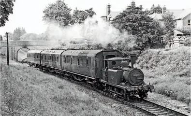  ?? TRANSPORT TREASURY/DR T GOUGH ?? Above: LBSCR A1X class No. 32678 at Langstone heading for Hayling Island with a three-coach train from Havant on August 21, 1960, when the diminutive loco was exactly 80 years old. The preserved Kent & East Sussex Railway-based 0-6-0T, which recently emerged from a two-year overhaul in Southern Railway livery as No. 2678, is to spend June in familiar territory on the Isle of Wight, where it operated from 1929-36.