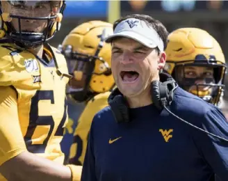  ?? Associated Press ?? West Virginia coach Neal Brown on redshirt freshman center Briason Mays receiving so much playing time: “As a coach you’d probably prefer them to be a little older, but we got to play the best guys and our young people have shown that they’re ready to play.”