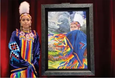  ??  ?? Photo contribute­d BLOOD TRIBE’S Katari Right Hand STANDS BESIDE THE portrait done by ARTIST LEXI HILDERMAN AND IS THE BASIS FOR THIS YEAR’S Calgary Stampede POSTER.