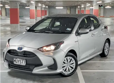  ?? PHOTOS: DAMIEN O’CARROLL/STUFF ?? Some might find the Yaris hybrid’s looks challengin­g, but you can’t deny its impressive fuel-miser credential­s.