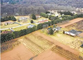  ?? /KEVIN RICHARDSON / BALTIMORE SUN ?? An aerial view of a farm in Baltimore County where nearby residents are angry about the odor from a hemp crop that was part of a state pilot program.