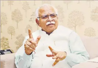  ?? HT FILE ?? EXUDING CONFIDENCE Khattar says there would be no adverse impact of raging pandemic on the state government’s welfare ■ schemes.