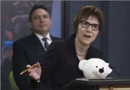  ?? ADRIAN WYLD, THE CANADIAN PRESS ?? First Nations Chief Perry Bellegarde listens to Cindy Blackstock, executive director of the First Nations Child and Family Caring Society respond to a question during a news conference.