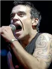  ?? PHOTO: STUFF ?? Rosemary McLeod: I don’t think it’s good form to use symbols of significan­ce to other cultures, the way Robbie Williams did when he got a Ma¯ ori tattoo here.