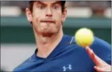  ?? CHRISTOPHE ENA — THE ASSOCIATED PRESS ?? Andy Murray eyes the ball as he plays Andrey Kuznetsov during their first round match at the Roland Garros stadium Tuesday in Paris.