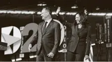  ?? Erin Schaff / New York Times ?? Sen. Kamala Harris is joined by husband Douglas Emhoff after accepting the vice presidenti­al nomination Wednesday.