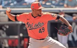  ?? KIM KLEMENT NEITZEL/USA TODAY SPORTS ?? Orioles pitcher Julio Teheran throws a pitch against the Yankees on March 11 at George M. Steinbrenn­er Field in Tampa, Fla.