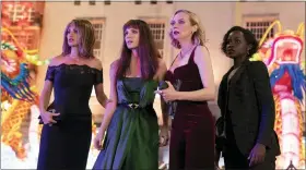  ?? UNIVERSAL PICTURES VIA AP ?? This image provided by Universal Pictures shows Penelope Cruz as Graciela, Jessica Chastain as Mason “Mace” Brown, Diane Kruger as Marie and Lupita Nyong’o as Khadijah in a scene from “The 355,” co-written and directed by Simon Kinberg.