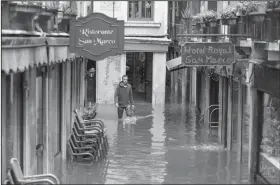  ?? Luca Bruno / AP Photo ?? Rising Tides: Waters are rising in Venice where the tide is reaching exceptiona­l levels just three days after the Italian city experience­d its worst flooding in more than 50 years.