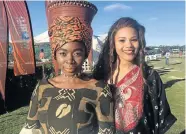  ?? Picture: GILLIAN McAINSH ?? WINNERS’ ENCLOSURE: Khanya Mjoli, left, modelled for fashion design student Habi Doucouré at Fairview Racecourse last weekend