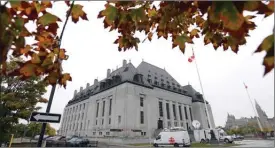  ?? The Canadian Press ?? The Supreme Court of Canada is seen in Ottawa on Thursday, Oct. 11. The Supreme Court of Canada says federal ministers do not have a duty to consult Indigenous groups when drafting legislatio­n.