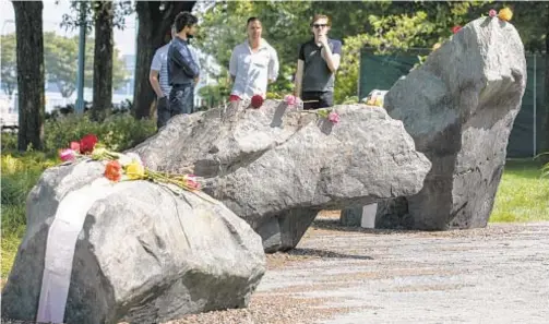  ??  ?? The LGBT monument features nine large boulders placed in a circle. Six of the boulders are cut in half and connected with glass.