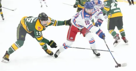  ?? CITIZEN FILE PHOTO ?? Ethan de Jong of the 2017-18 Prince George Spruce Kings powers past Carmine Buono of the Powell River Kings during last season’s Coastal Conference final playoff series. The teams clash again tonight at Rolling Mix Concrete Arena.