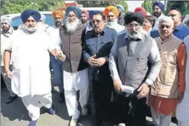  ?? SANJEEV SHARMA/HT ?? ■ (From left) Akali Dal president Sukhbir Singh Badal, former CM Parkash Singh Badal, BJP state president Shwait Malik, former minister Daljit Singh Cheema and others after meeting Punjab governor VP Singh Badnore in Chandigarh on Tuesday.