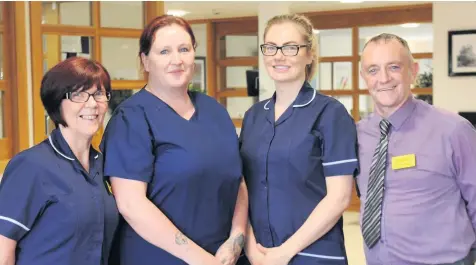  ??  ?? All smiles Deputy manager Kay Pounder, unit manager Katrina Cameron, admission nurse Lesley Delaney, and home manager Charlie Allan